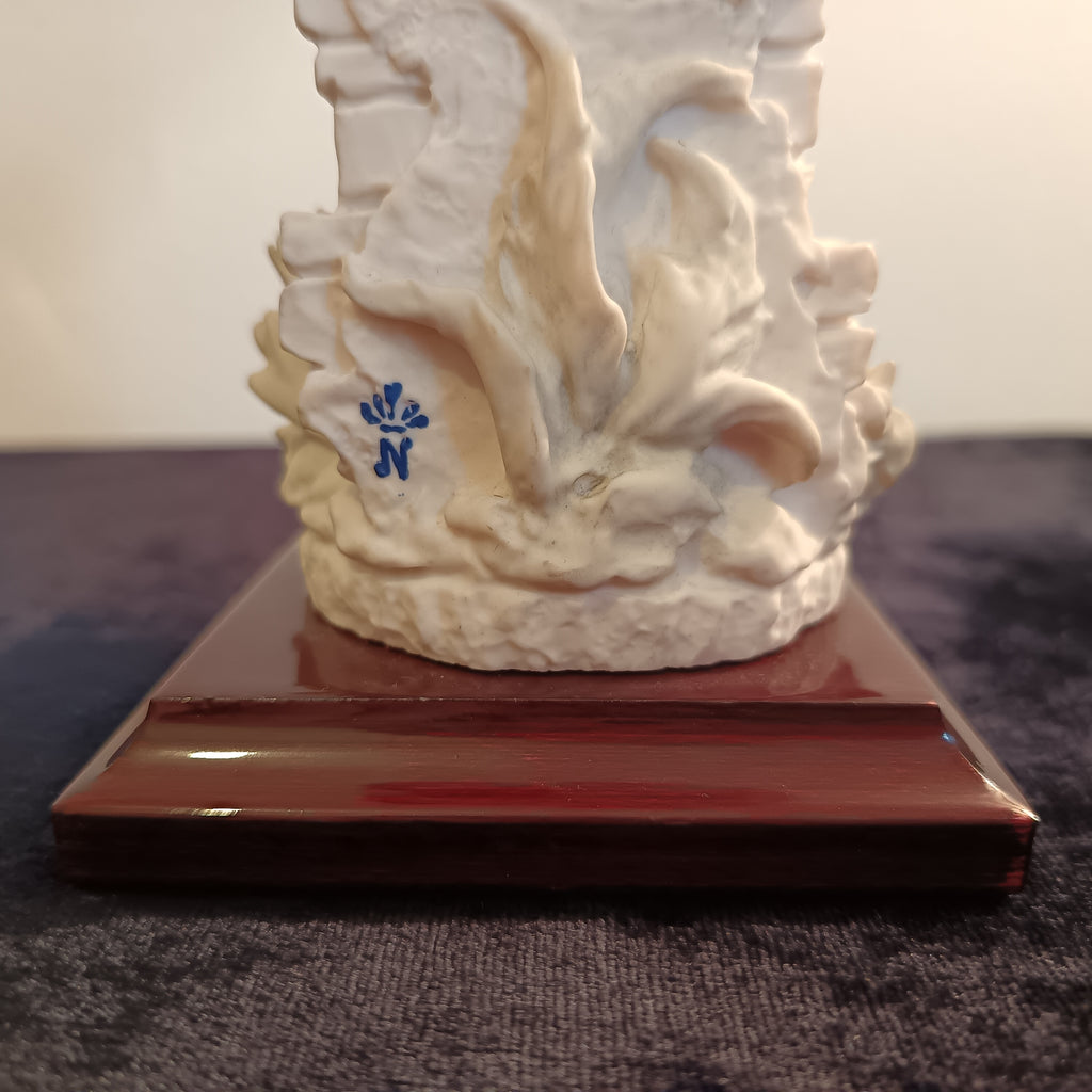 A pair of Capademonte figurines Winter & The country boy by G Armani