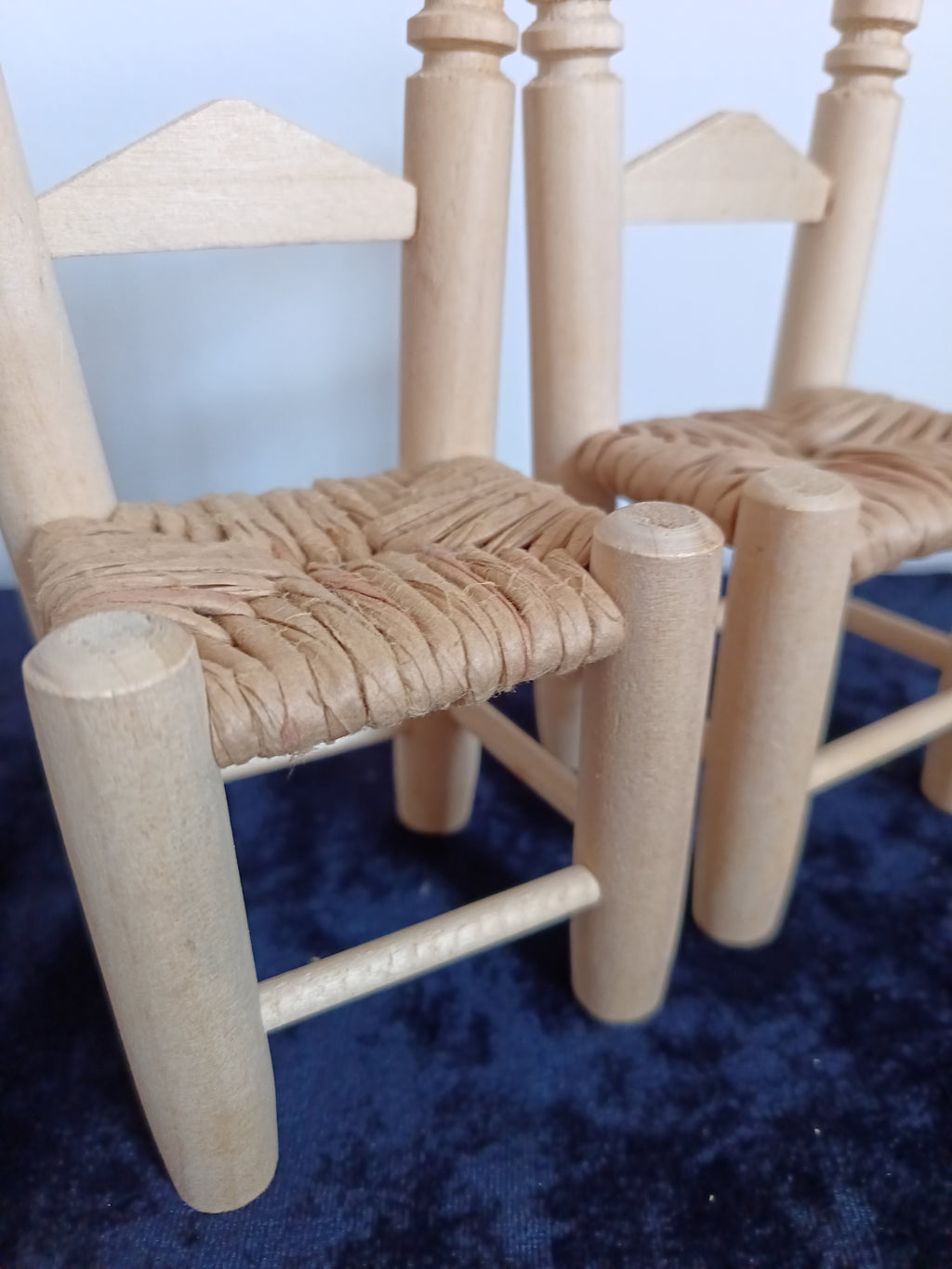 Vintage-style miniature Dolls wooden woven seat chairs.