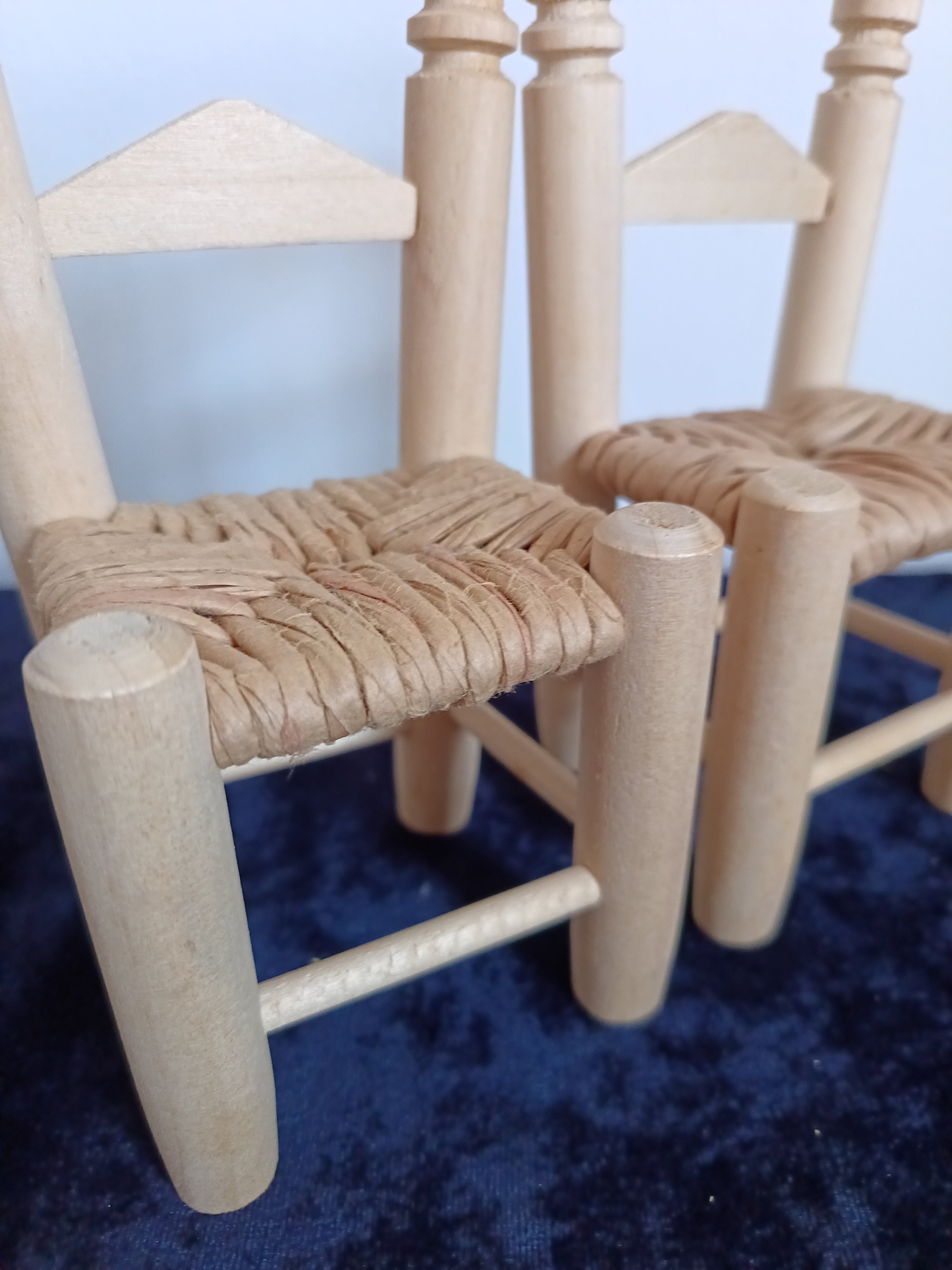 Vintage-style miniature Dolls wooden woven seat chairs.