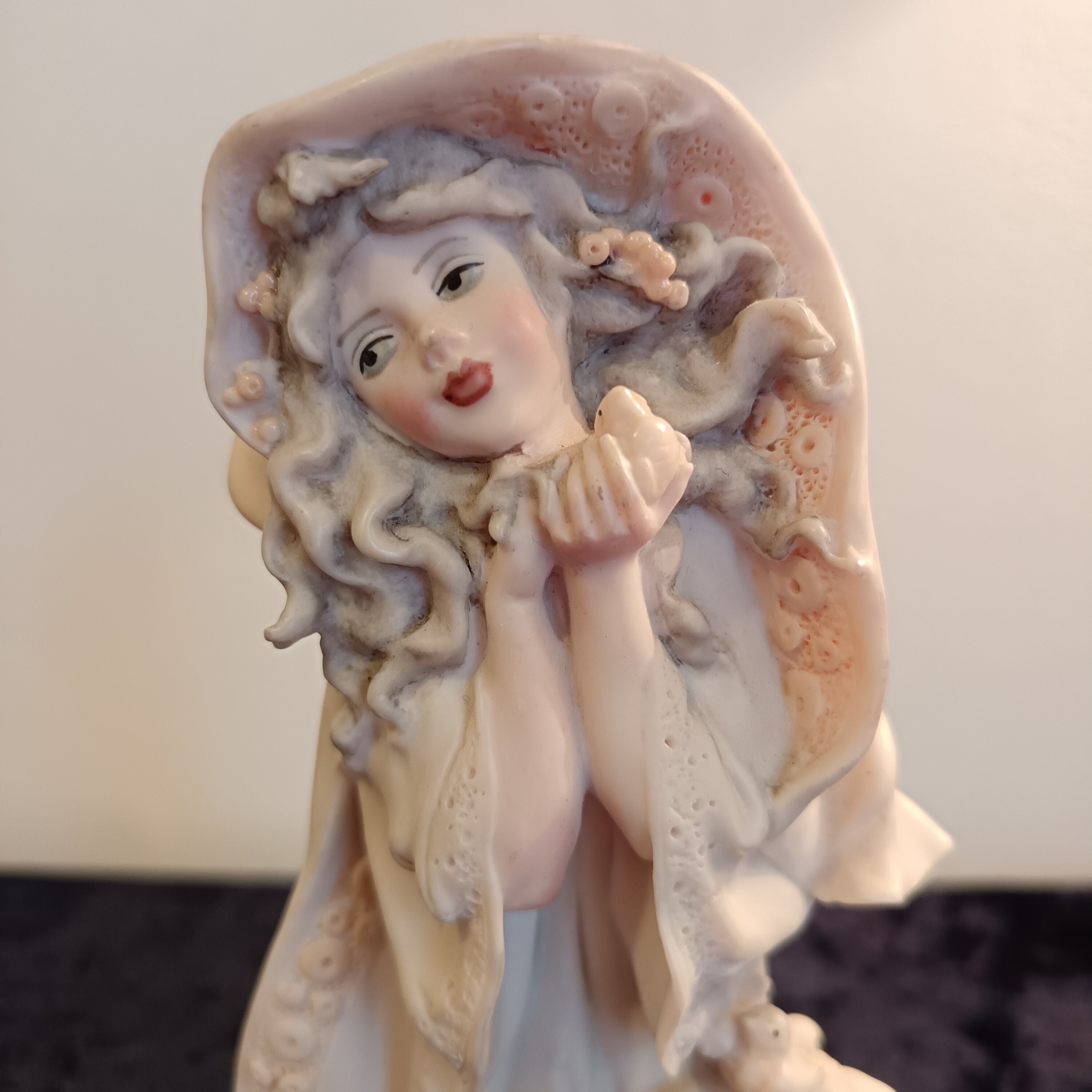 A pair of Capademonte figurines Winter & The country boy by G Armani