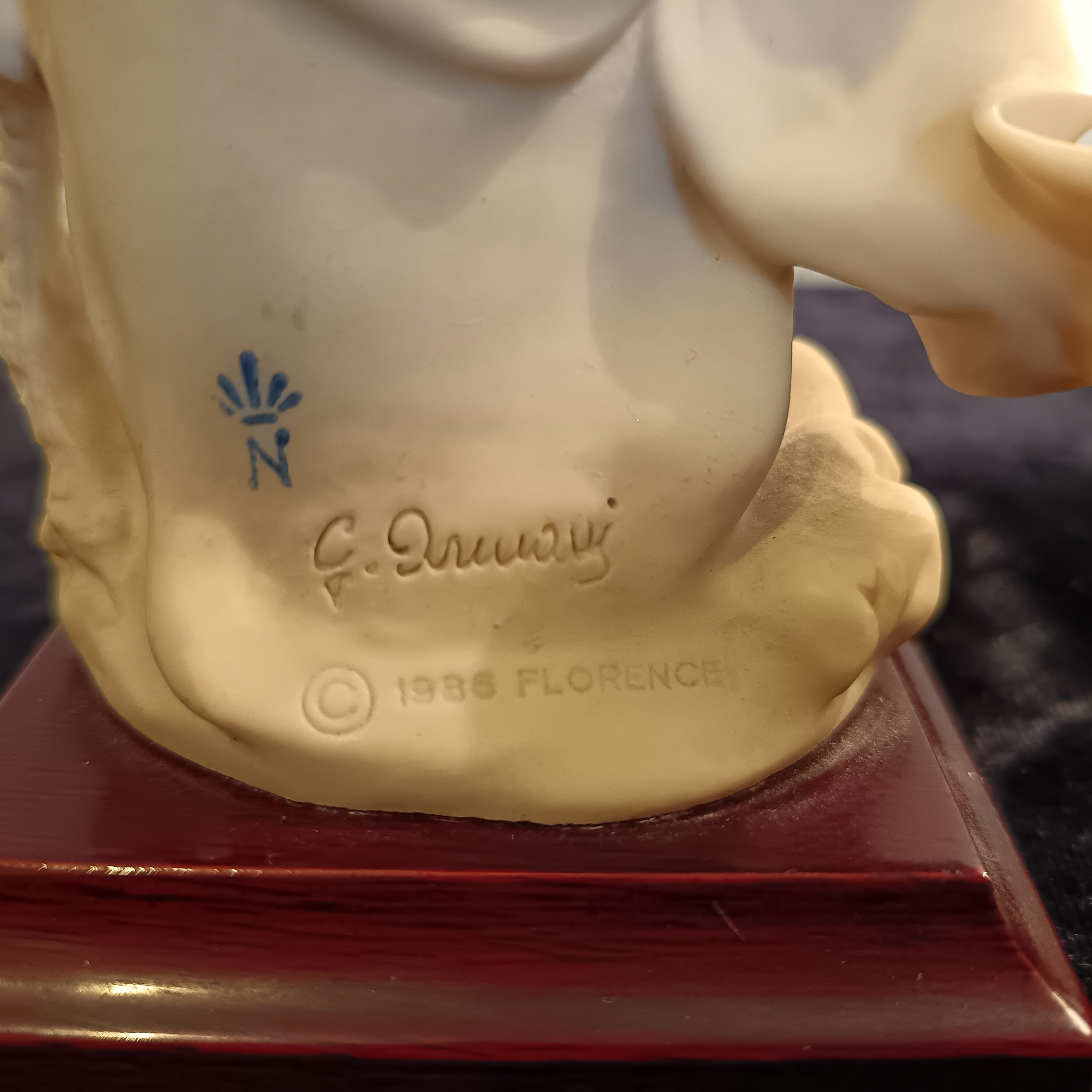 A pair of Capademonte figurines Winter & The country boy by G Armani