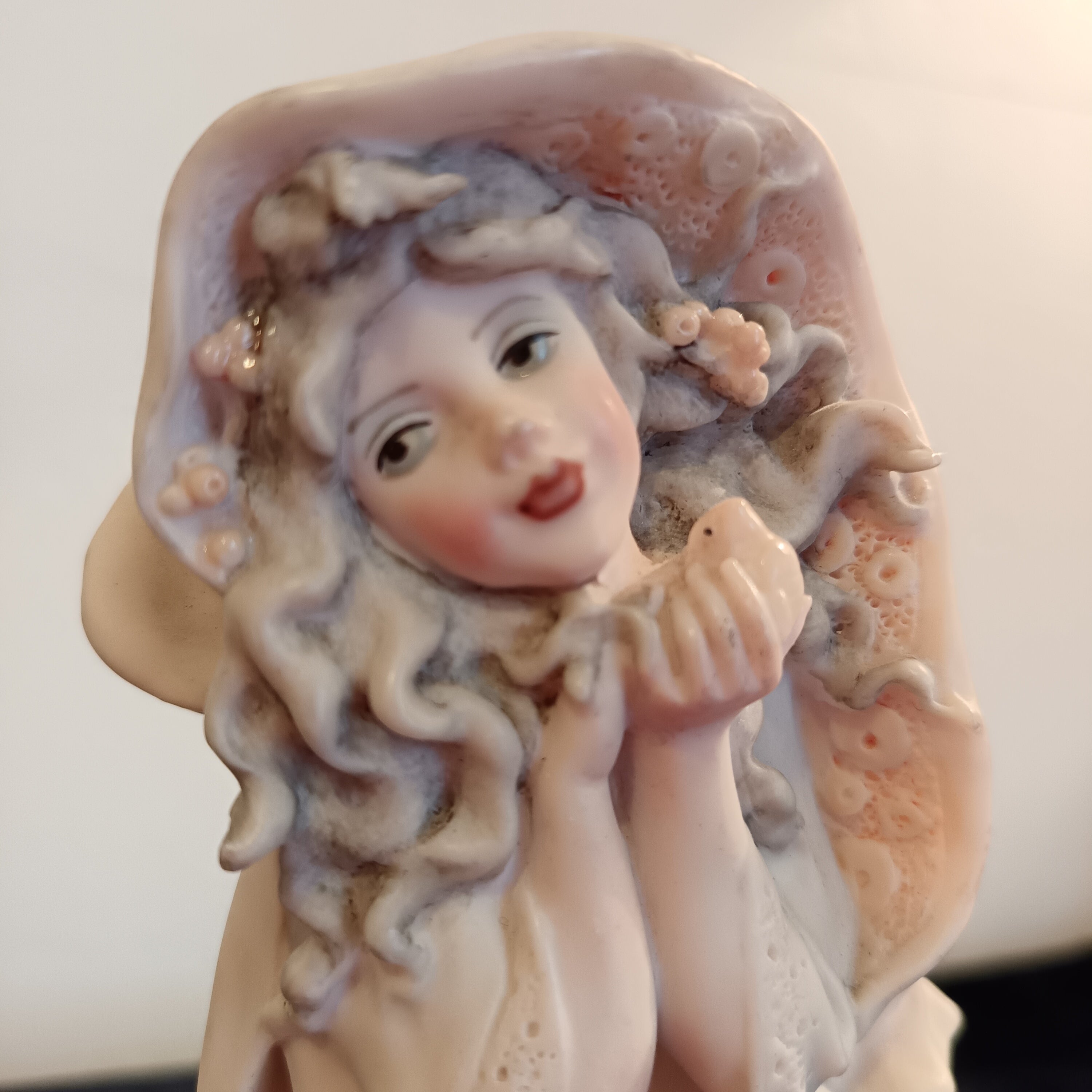 A pair of Capademonte figurines Winter & The country boy by G Armani