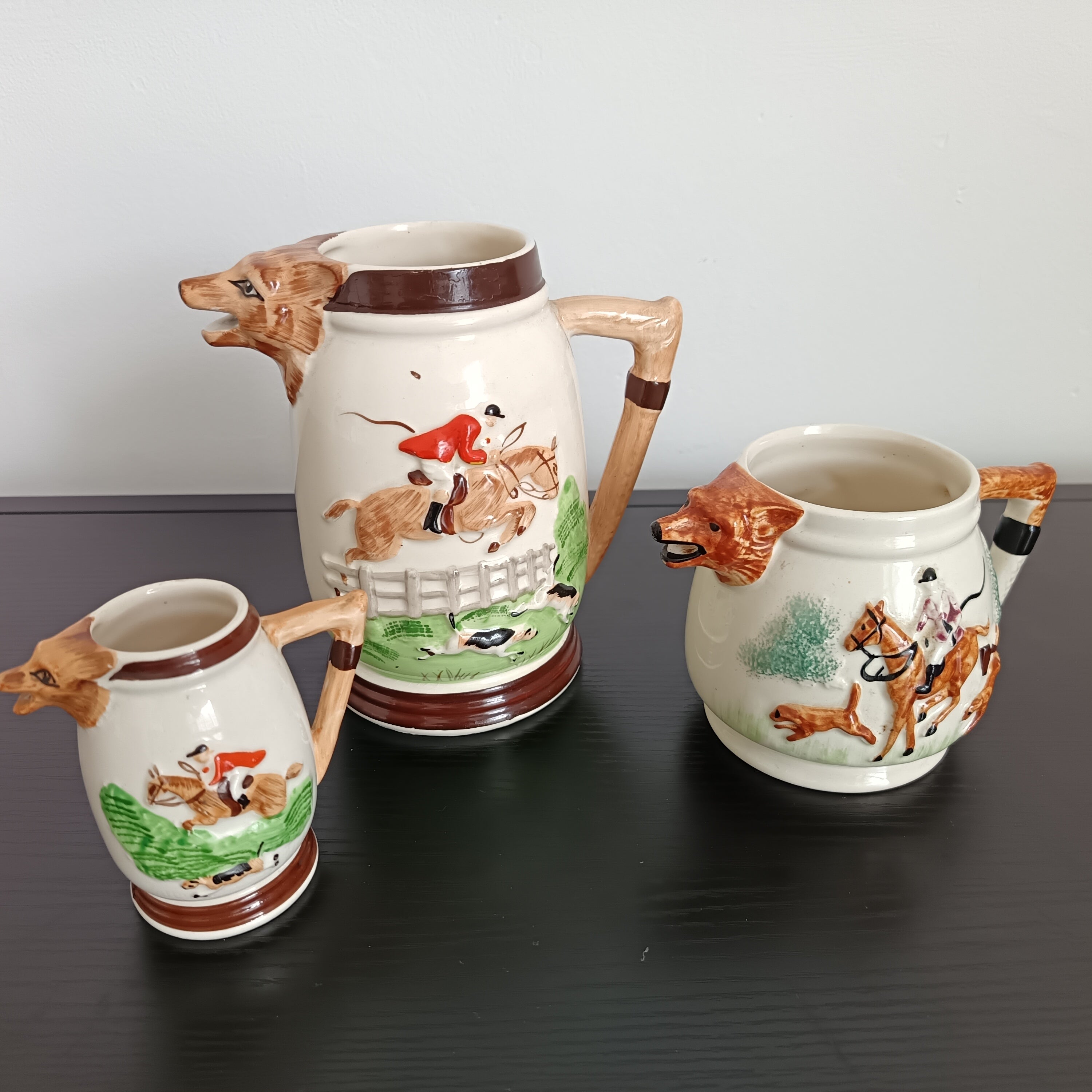 1950's Keele Pottery Huntsman trio water jugs.